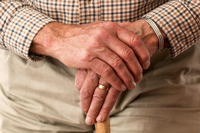 holding a cane